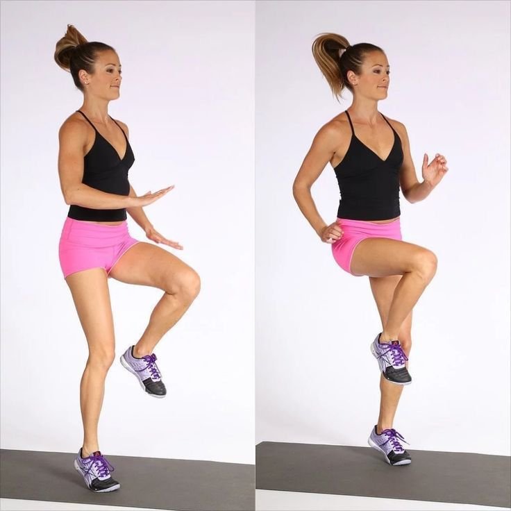 Woman performing high knees as part of a cardio workout at home.