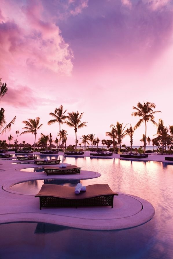 Secrets Maroma Beach, a romantic resort in Mexico with swim-out suites and a peaceful ambiance.