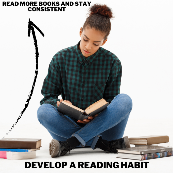 Young woman reading a book while sitting with books around her. Develop a reading habit and stay consistent to read more books daily.